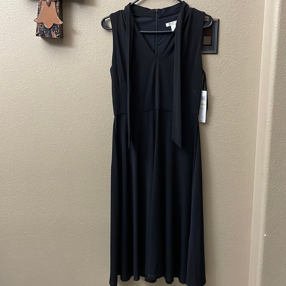 Ladies, Black mid length casual dress. NWT